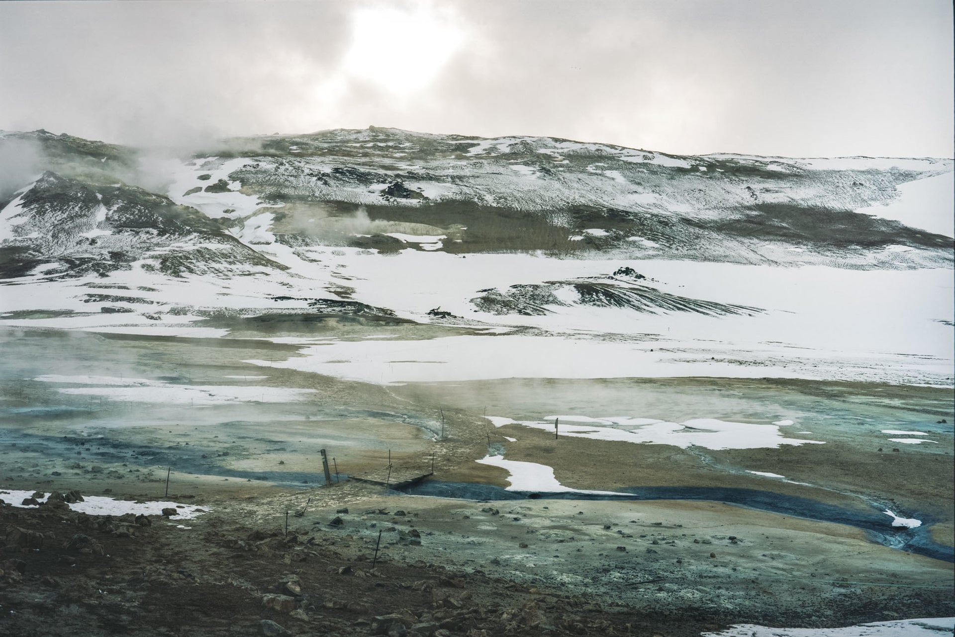 Hverir Iceland © Alison De Mars landscape snow volcano mountains bridge fine art photography